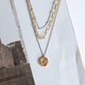 gold and silver layered necklace