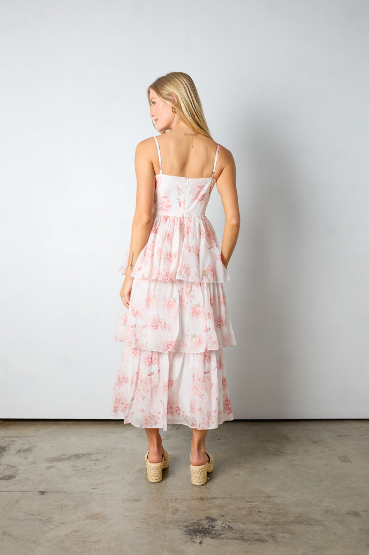pink tiered midi dress with bow detail