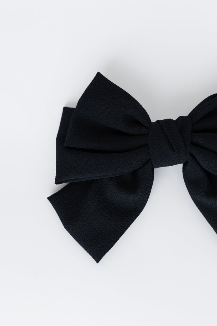 thick layered black bow