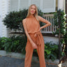 Rust high neck and tie waist jumpsuit
