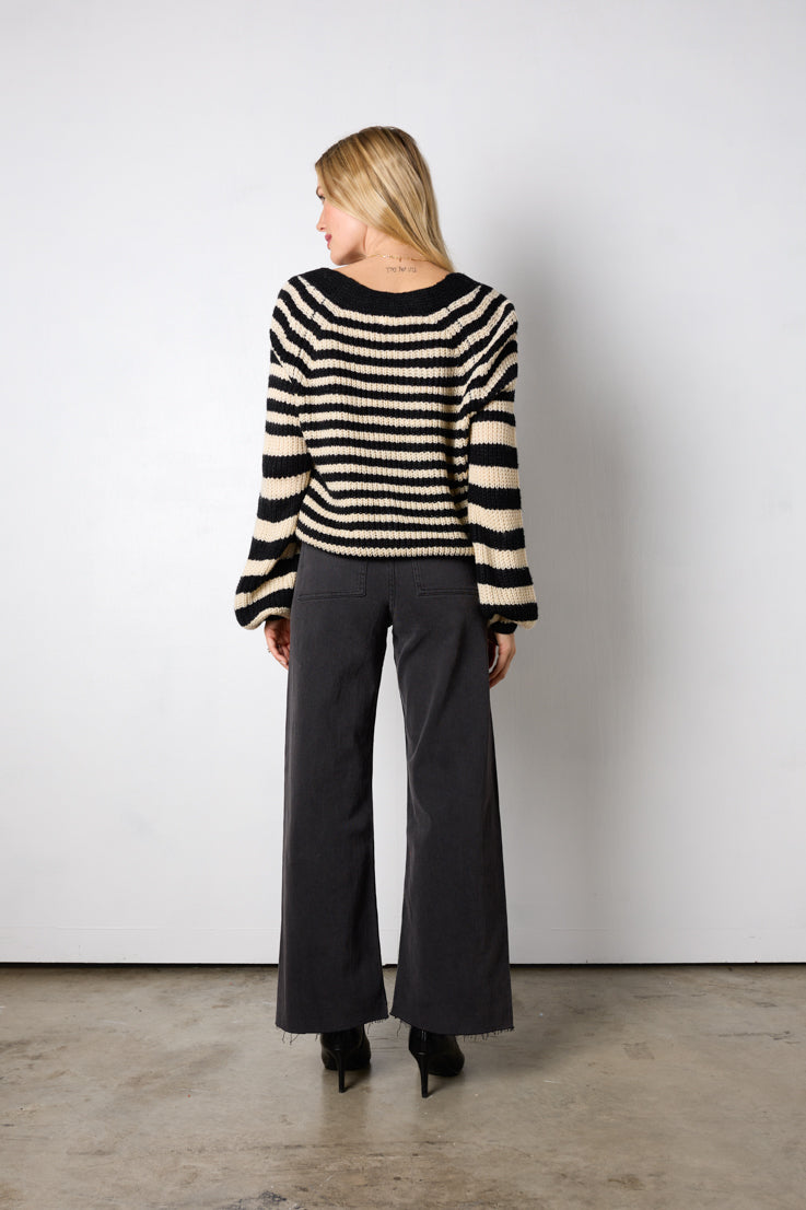 black and beige striped sweater