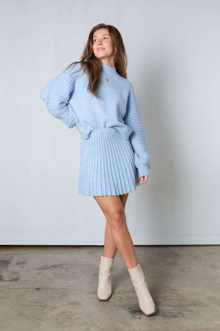 light blue knit sweater