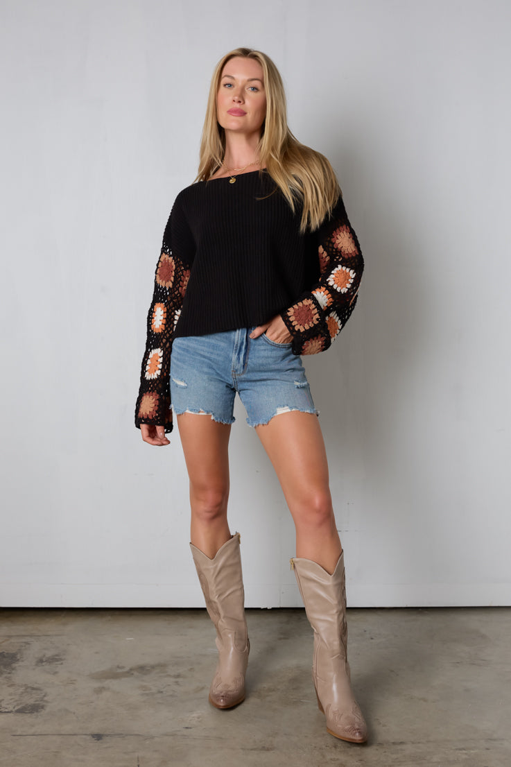 brown and black crochet sweater
