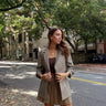 oversized brown plaid open blazer outfit with brown tank top and pleated brown mini skirt