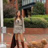 brown plaid set outfit with asymmetrical brown button detail mini skirt and a cropped structured matching blazer