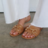 brown sandals with gold hardware