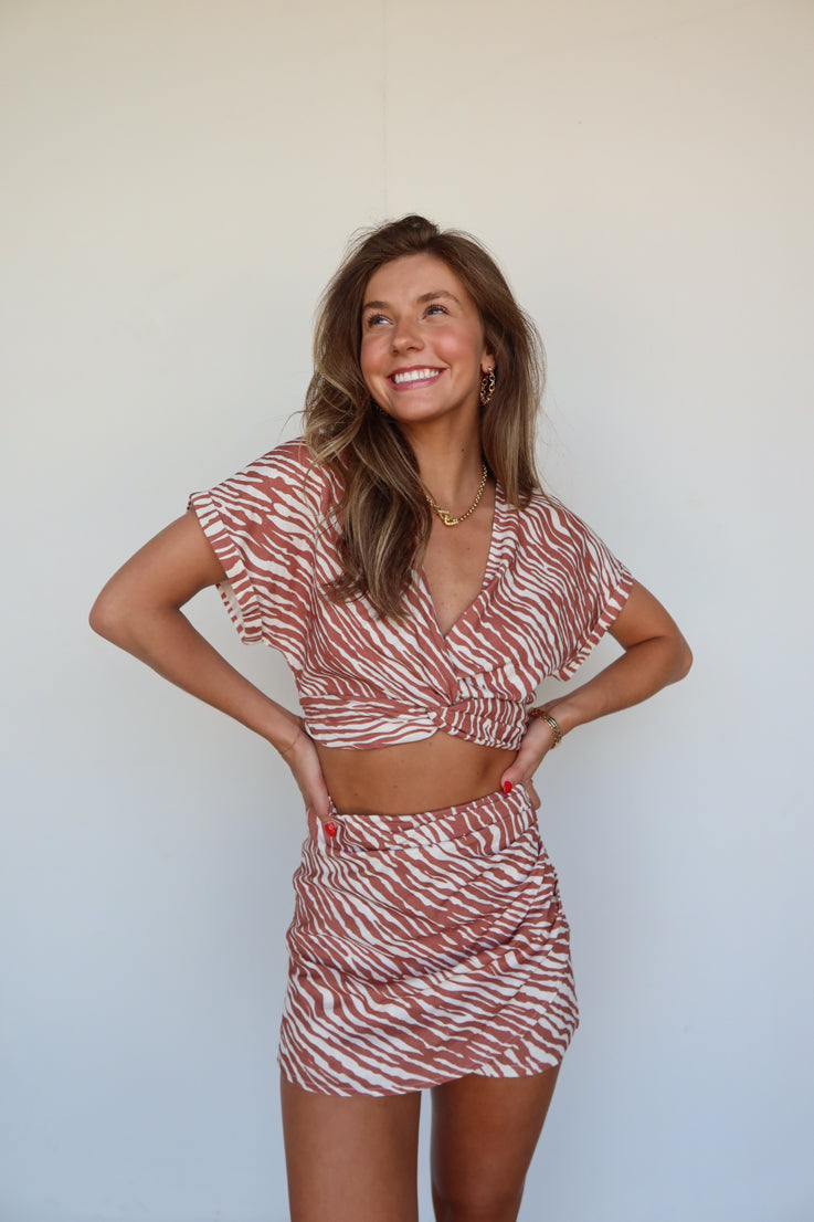 brown and white animal stripe top