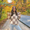 brown white checkered sweater