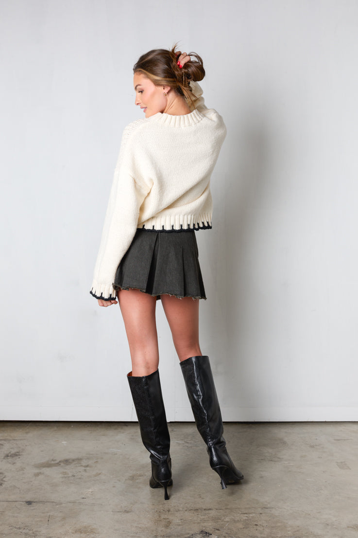cream cableknit sweater