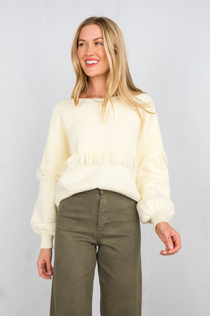 cream knit sweater with fringe