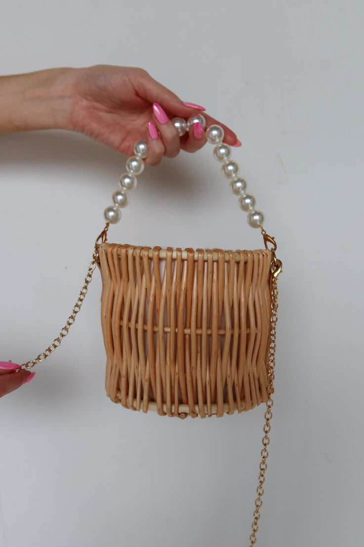 gold and pearl straw bag