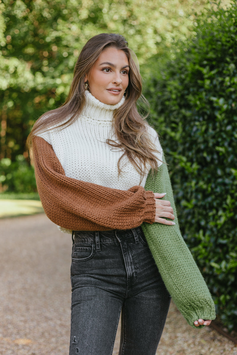 green brown cable knit sweater