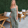 green jumpsuit