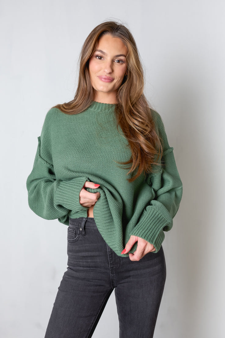 green oversized knit sweater