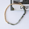 grey and gold bead necklace