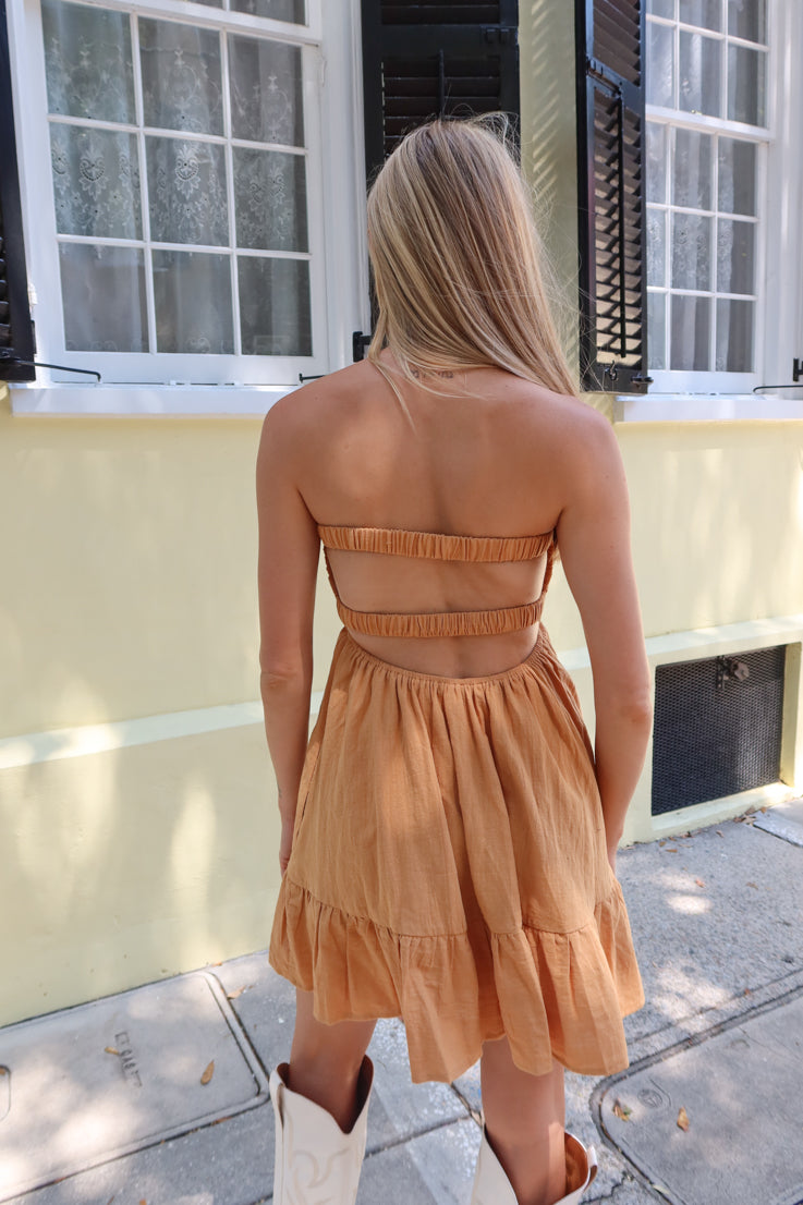 mustard double strap open back, a cute cutout beneath the bust, and a flowy dress overlay