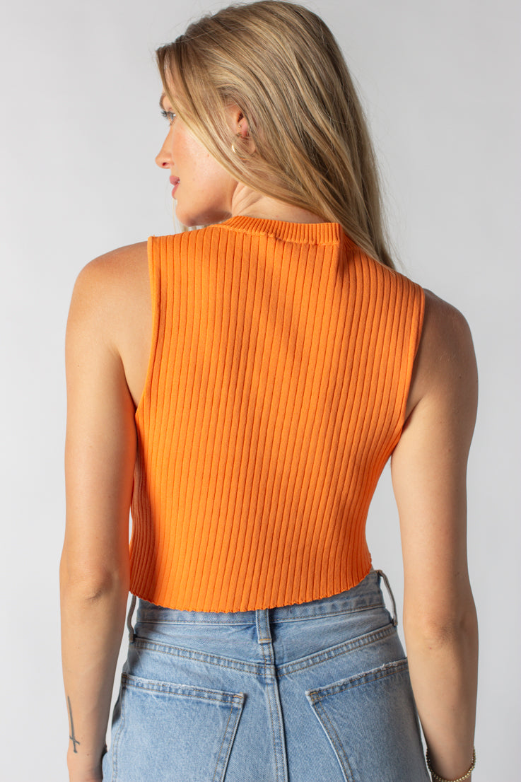 orange asymmetrical top
