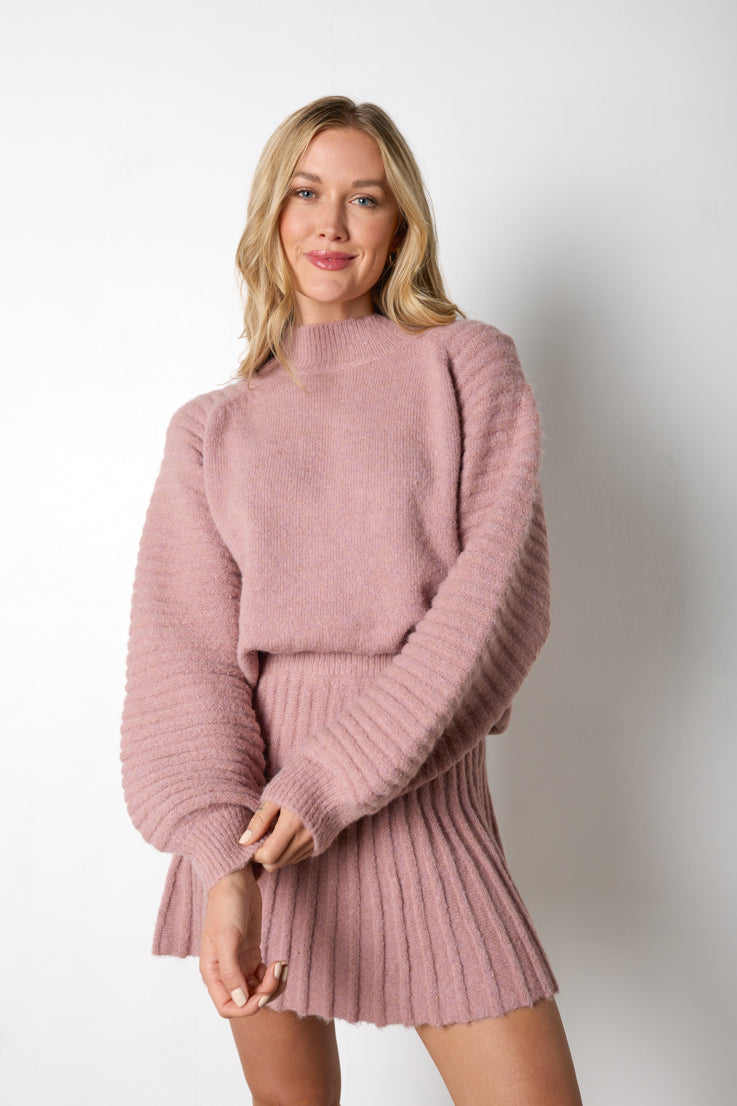 pink knit sweater