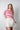 pink open knit sweater