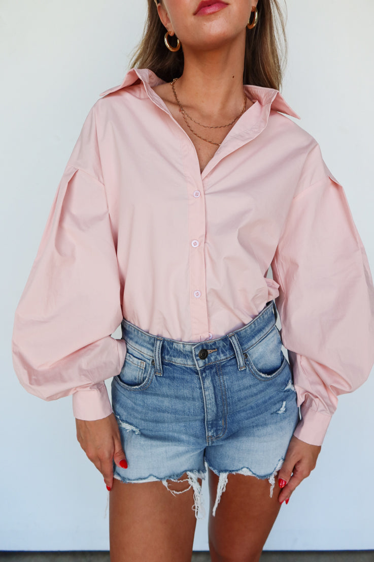 pink oversized button up top