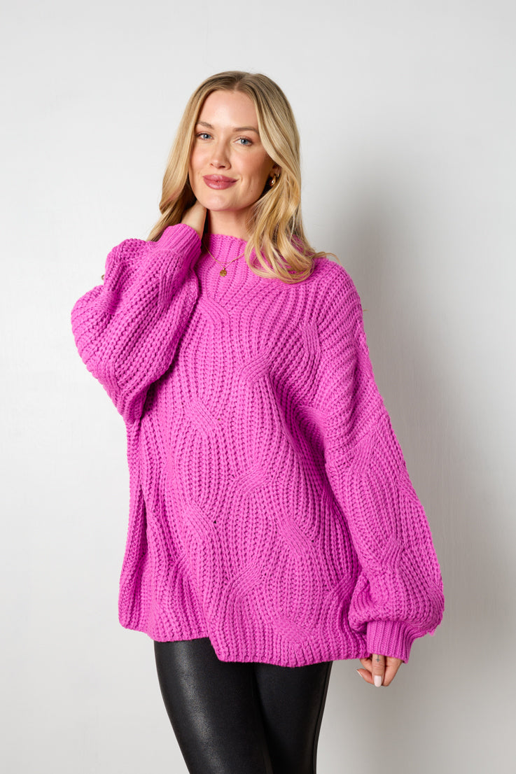 pink oversized cable knit sweater