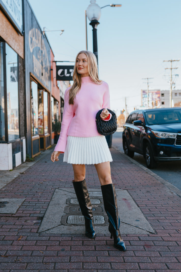 pink ribbed sweater