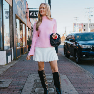 pink ribbed sweater