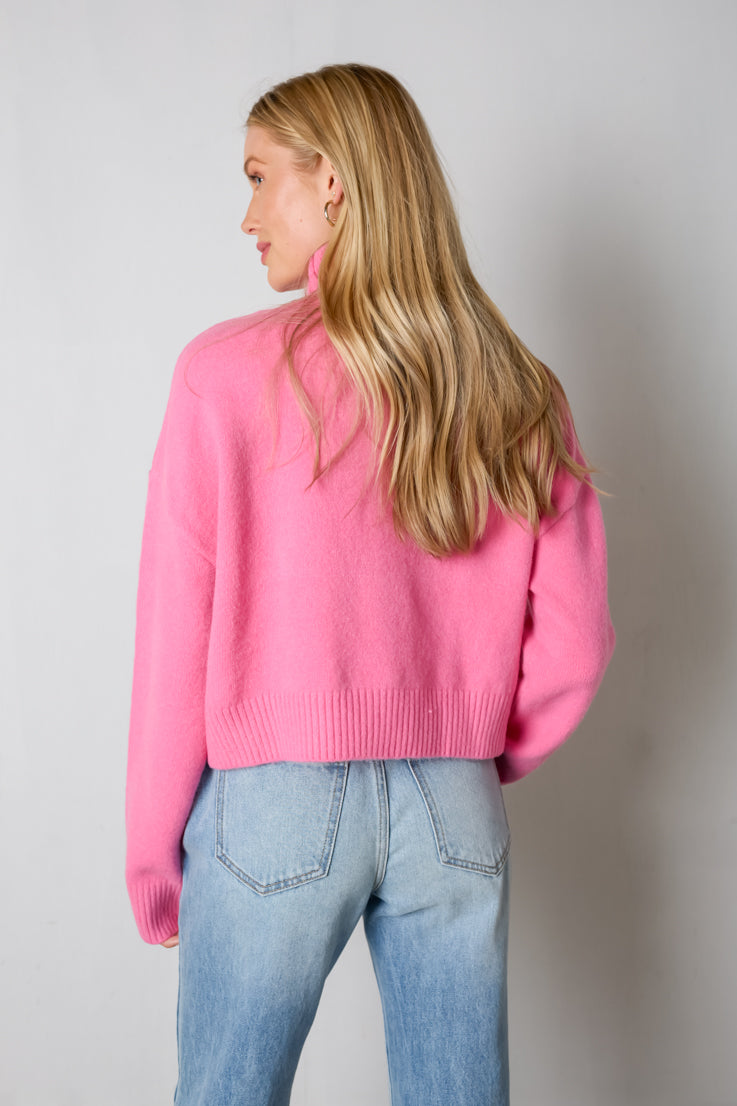 pink sweater with turtleneck
