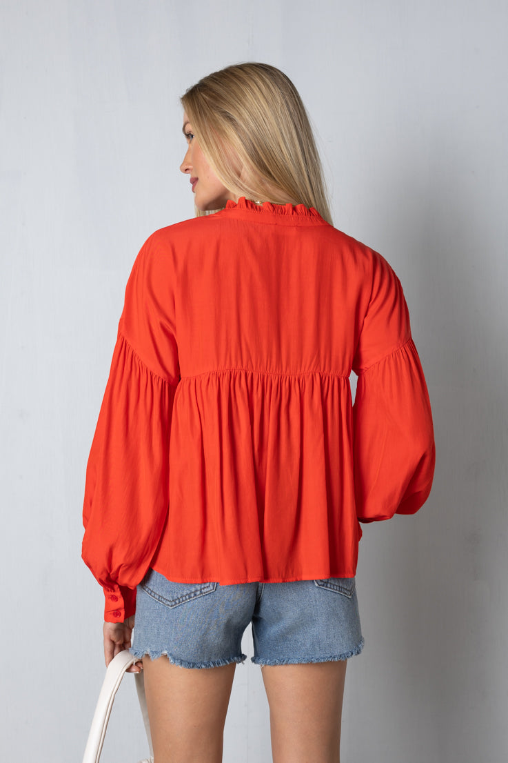 red babydoll style top