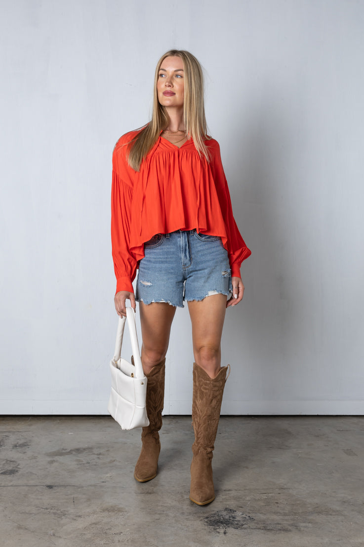 red babydoll style top