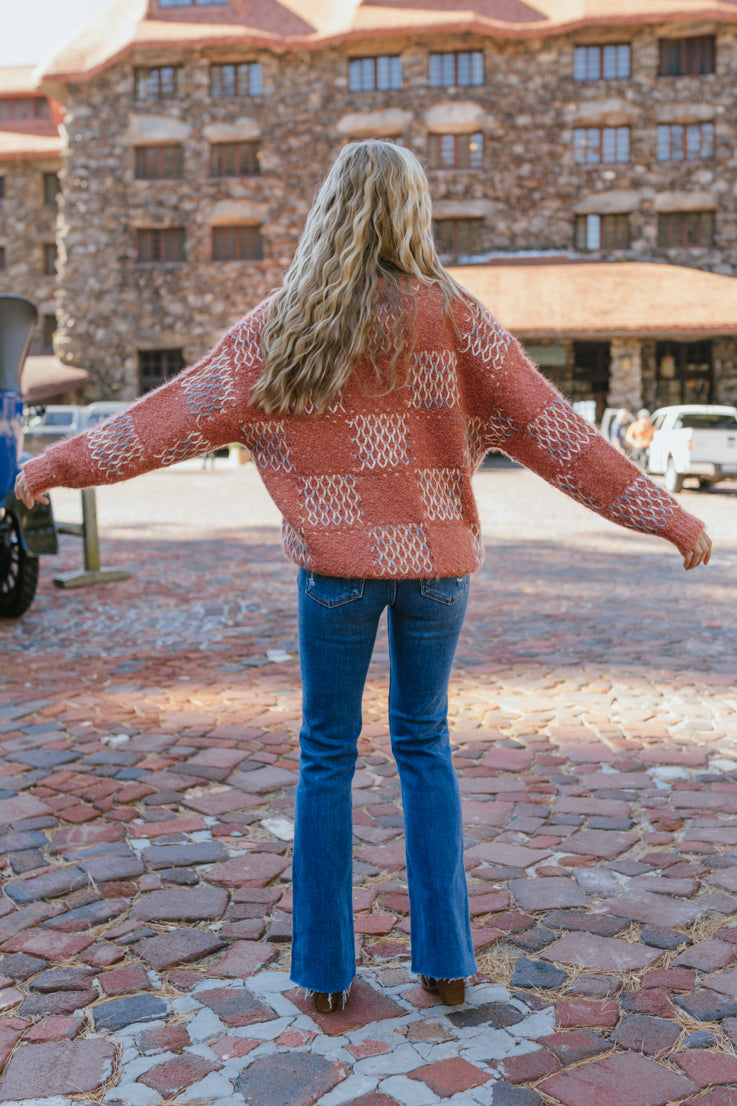 red checkered print knit sweater