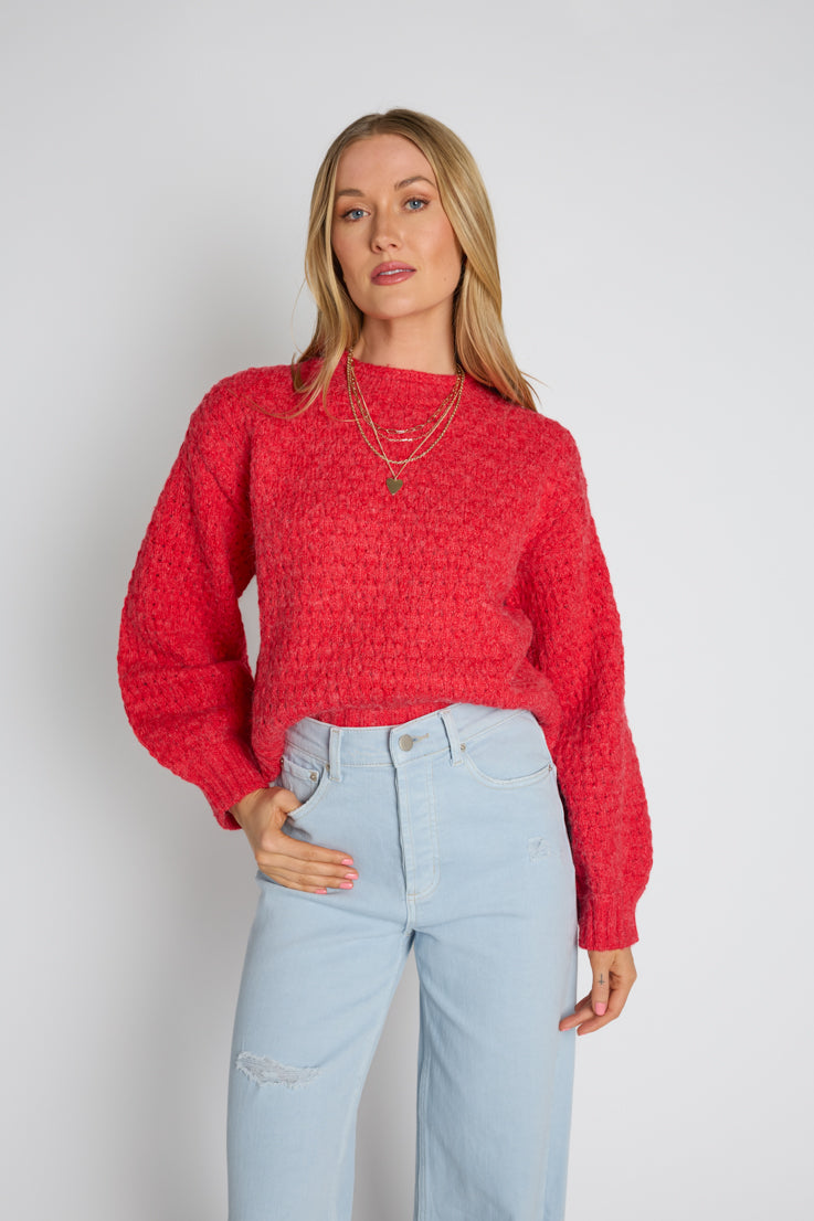red chunky sweater