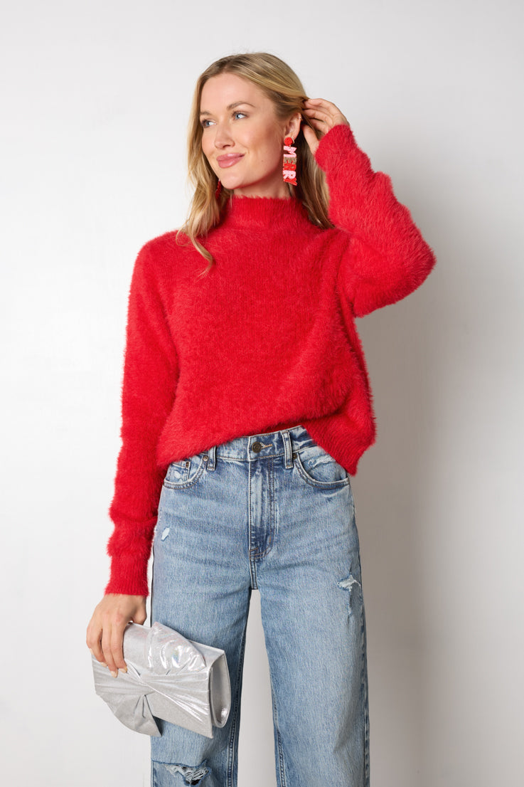 red fuzzy sweater