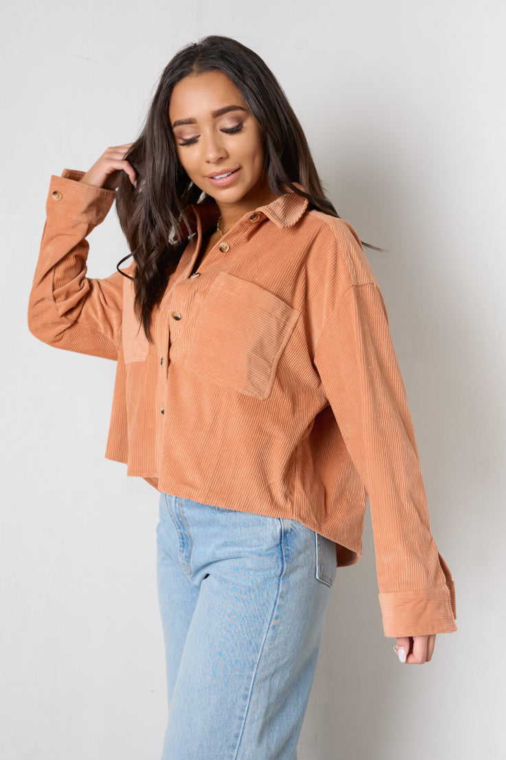 rust button up top