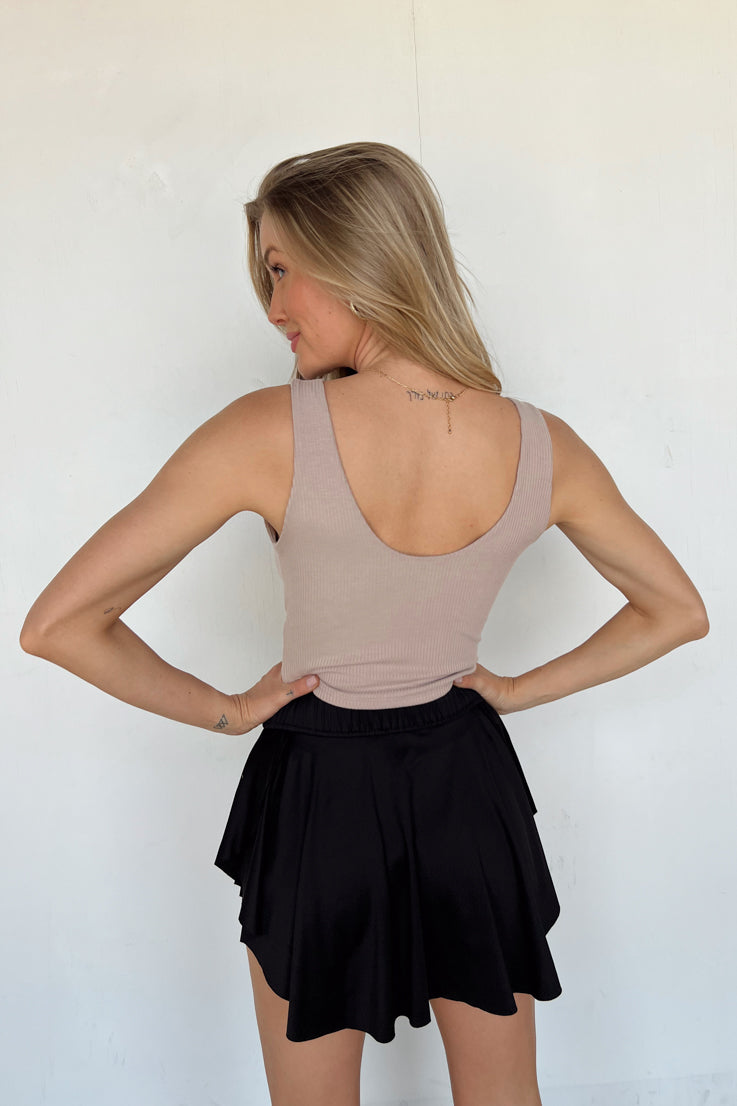 tan low v-neck with cut under bust tank