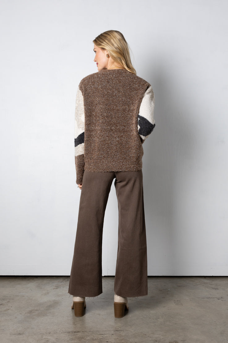 brown, grey, and cream tone sweater