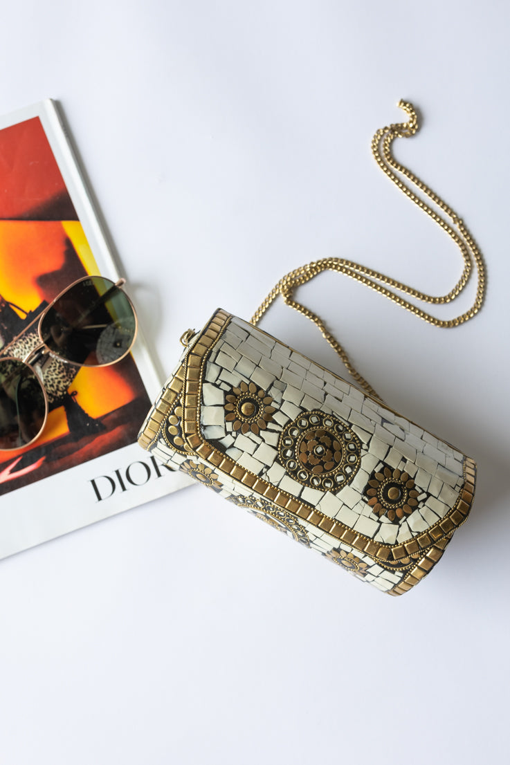 ivory tube bag with gold details