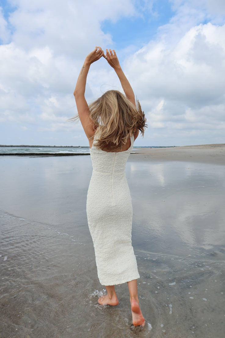 white crinkle dress with cut out under bust