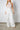 white jumpsuit lacey-floral halterneck bust
