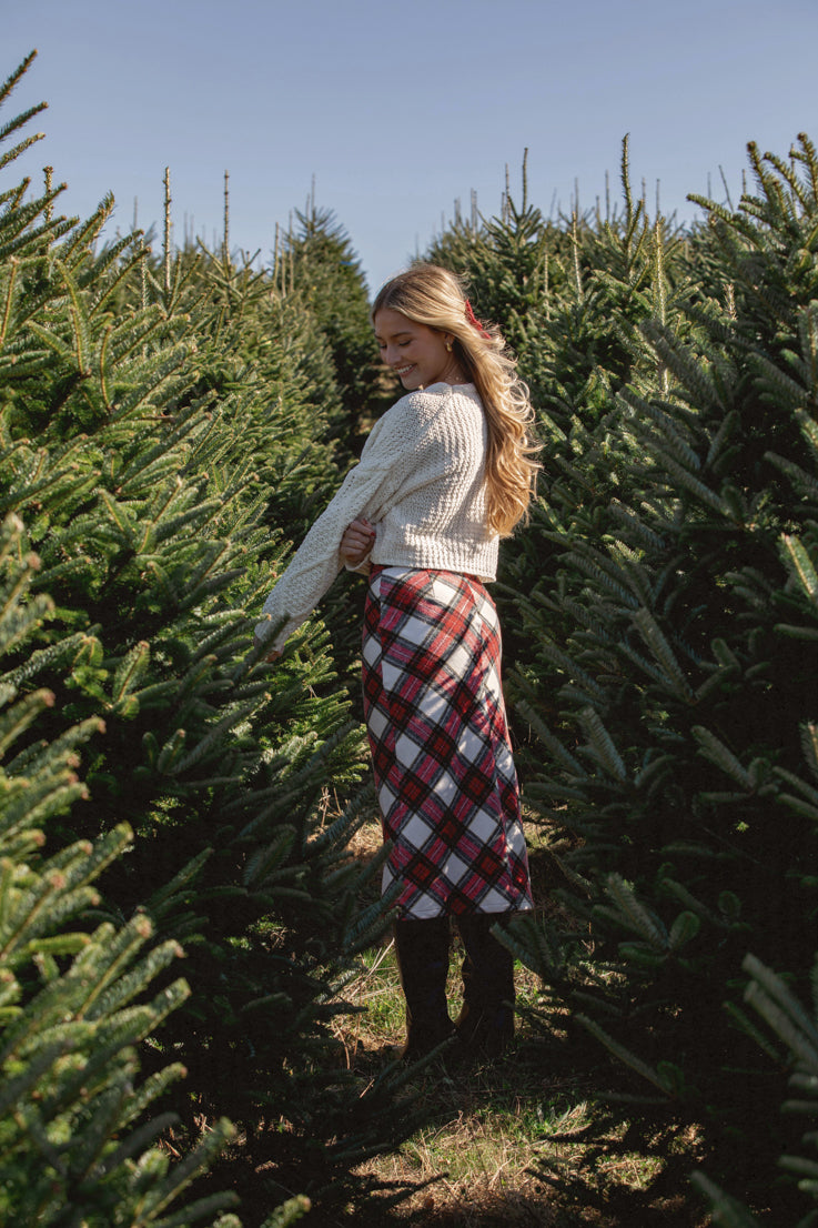 white midi skirt with red green plaid