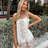 white mini dress with lace detail
