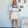 beige ruffled skort