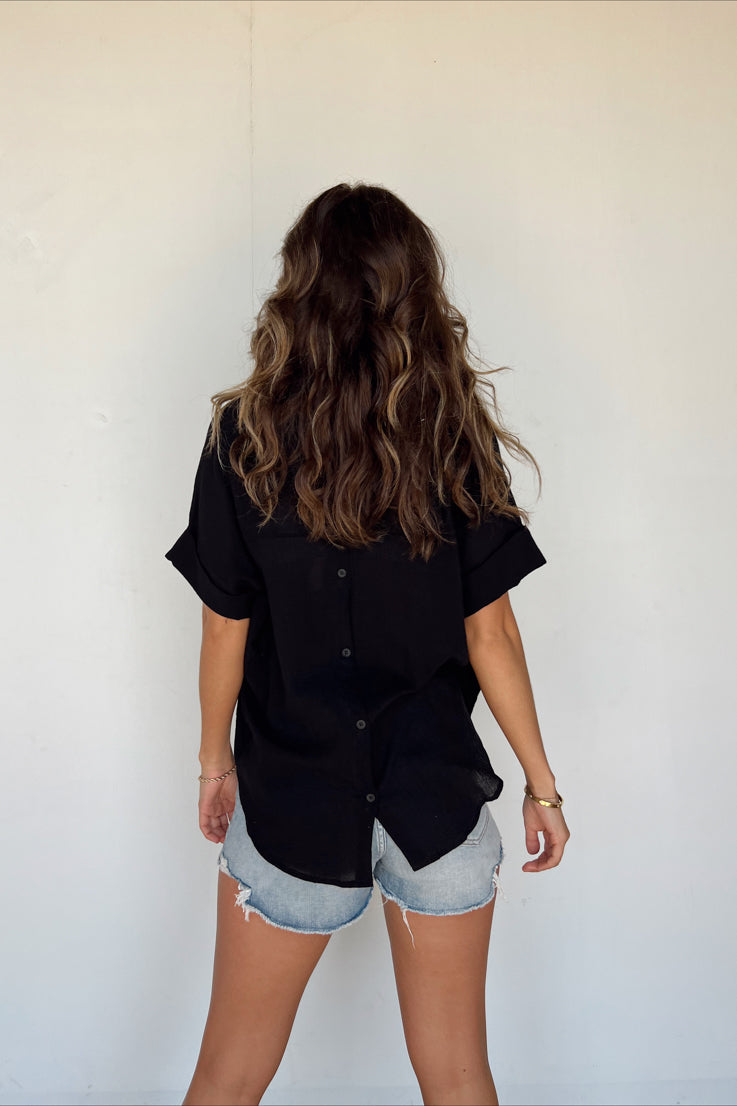 collard black top with buttons down the back