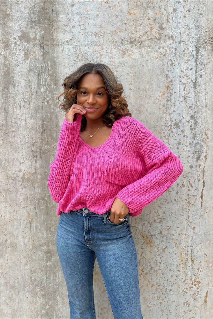 hot pink ribbed relaxed fit sweater with pocket on front