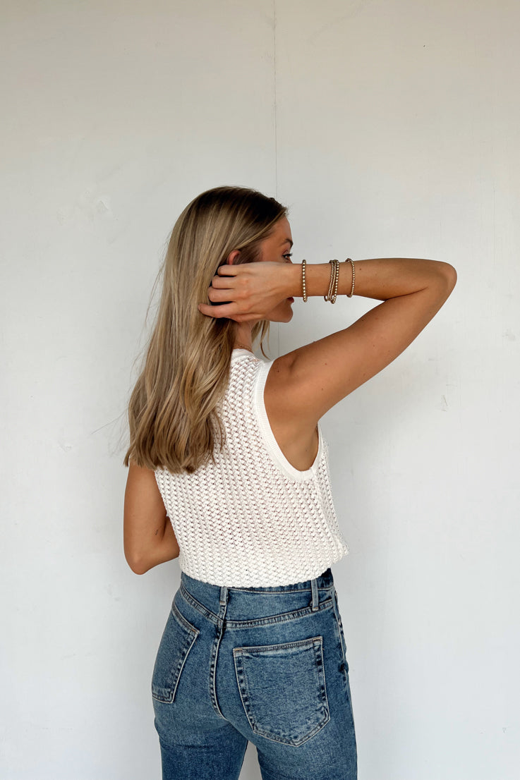 cream knit top with draw string