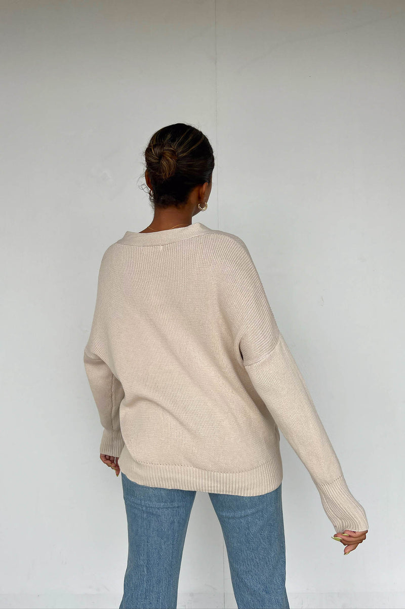cream sweater with buttons