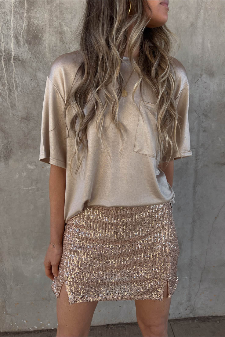 gold sequin glitter mini skirt with two small slits on the front