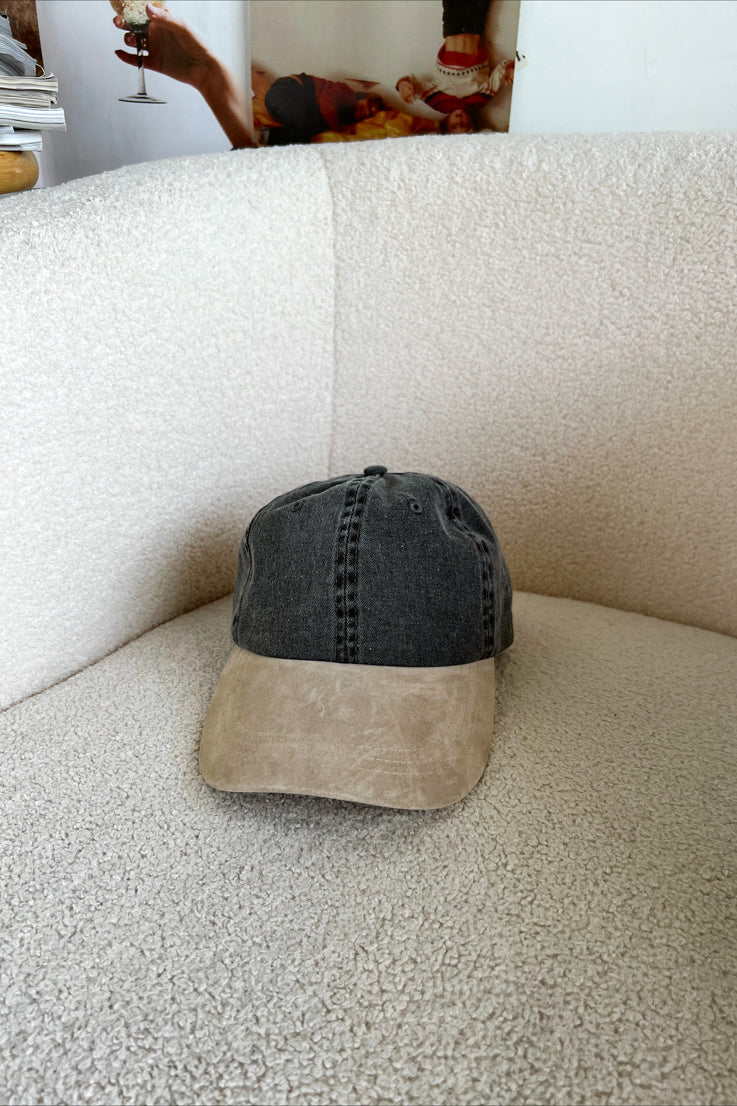 washed black and tan baseball cap