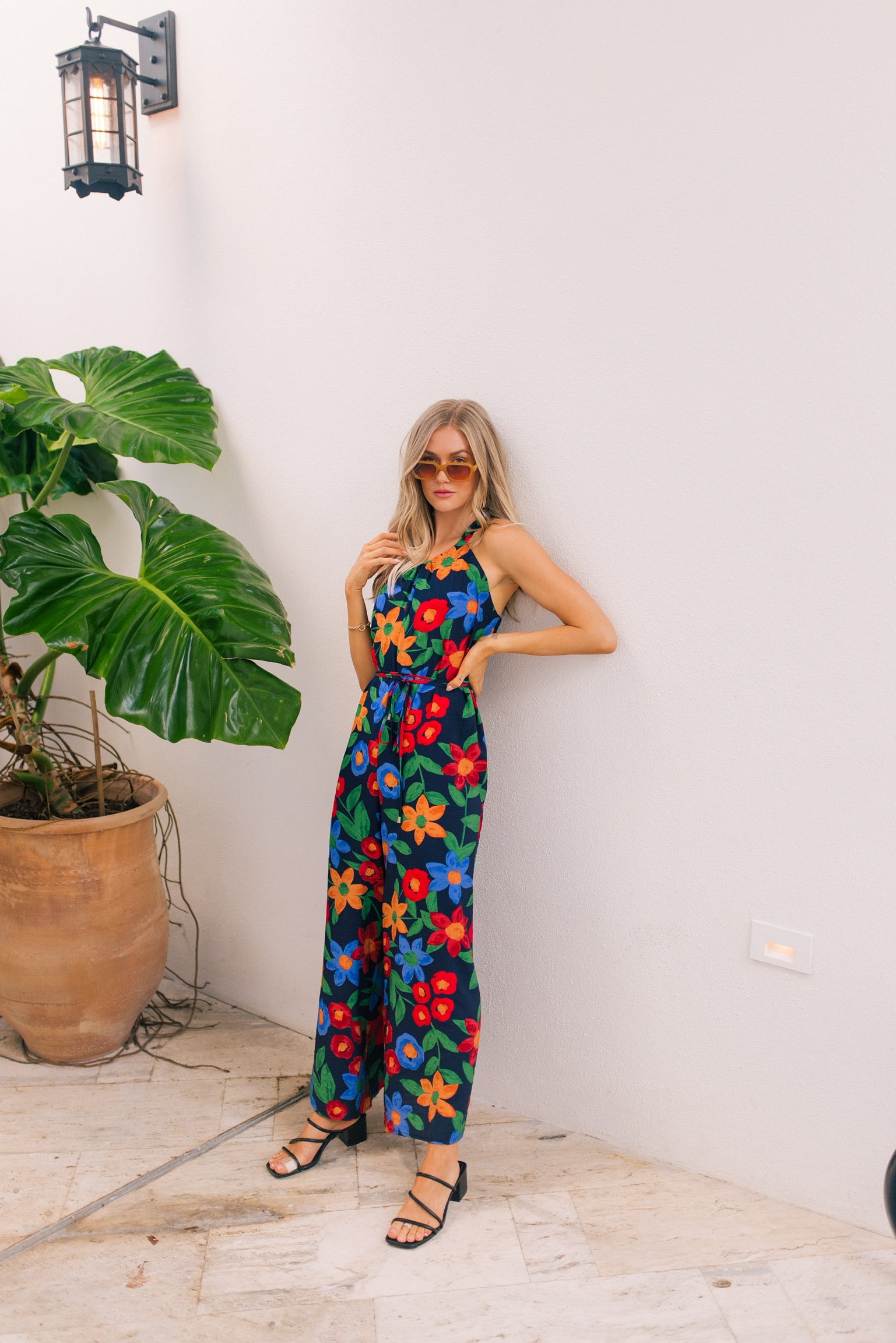 navy jumpsuit with flowers