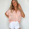 peach button down